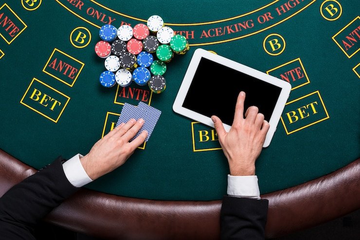 Filipino player reviewing jl11 promotion terms on a tablet device